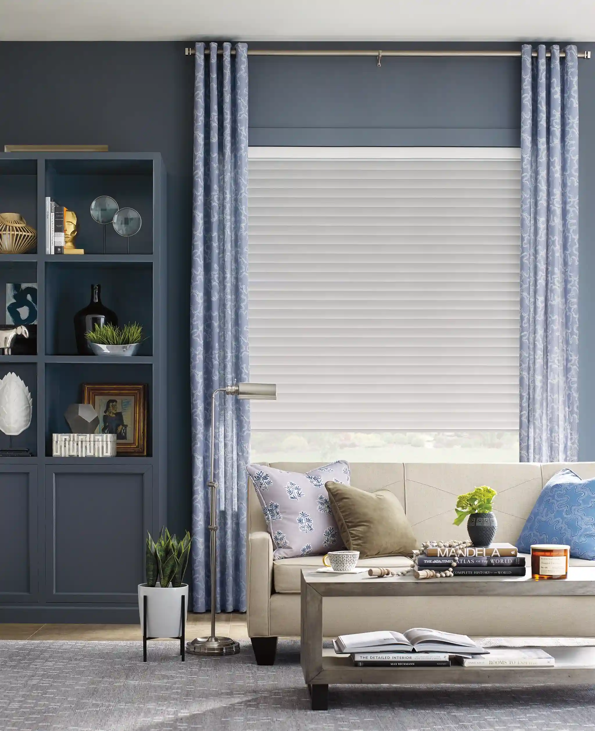 Professional window treatment consultation in a home setting